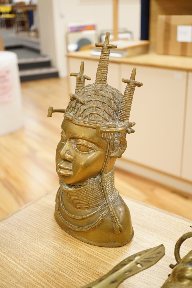 Three Benin type bronzes to include a bust, largest 47cm high